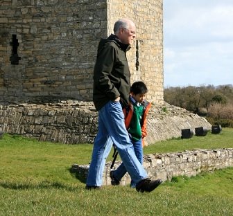 Photo of David Snowball walking with son