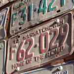 old license plates on a wall