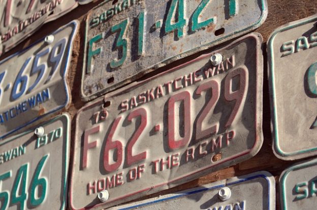 old license plates on a wall