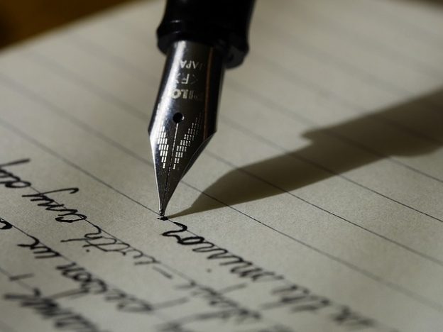 fountain pen writing a note