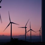 windmills against an evening sky