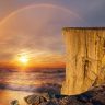 Rainbow over the ocean waves photo